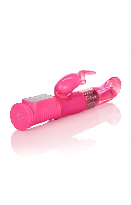 A pink toy with a rabbit shaped objectDescription automatically generated