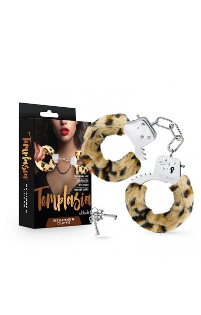 A pair of handcuffs with keysDescription automatically generated